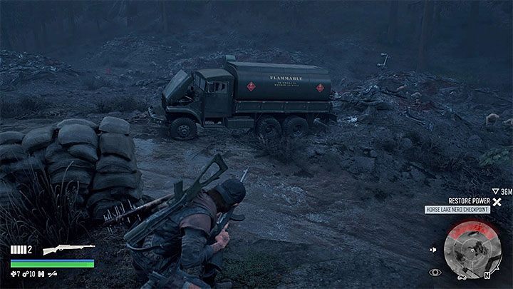 A good idea at the beginning of the battle is to throw the attractor in the vicinity of the fuel tank parked in this location - Days Gone: How to unlock One Down Trophy? - Trophy Guide - Days Gone Guide