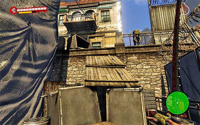 Jump over the containers and reach a ramp (screen above), which you have to use to continue you travel - Reach the Docks | Chapter 12 - With the Tide - Chapter 12 - With the Tide - Dead Island Riptide Game Guide
