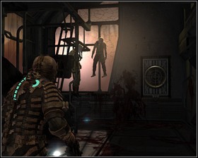 Through the cold storage window you can see bodies being changed into necromorphs - Dead Space Part 1 | Walkthrough - Walkthrough - Dead Space Game Guide & Walkthrough