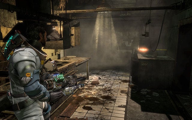 In the kitchen to the right, on one of the tabletops - Chapter 9 | Secrets - Secrets - Dead Space 3 Game Guide