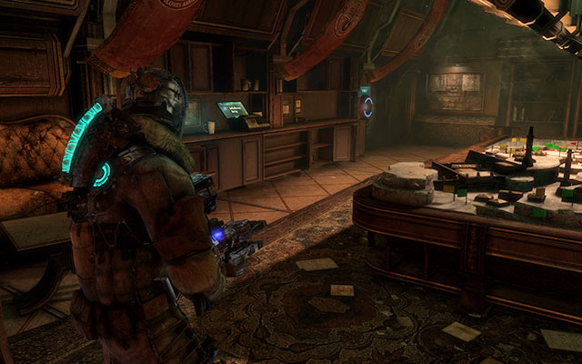 On the locker to the left, in the room with the model in the middle - Chapter 10 | Secrets - Secrets - Dead Space 3 Game Guide