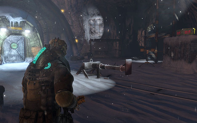 To the right, next to the scaffolding at the end of the rails - Chapter 10 | Secrets - Secrets - Dead Space 3 Game Guide