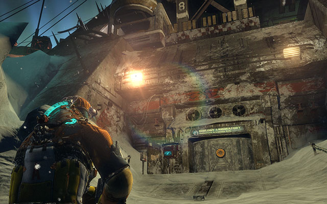 Keep going forwards, walking past the destroyed vehicle, until you reach the entrance to the facility - Find a way into the facility | 14: Everything Has Its Place - 14: Everything Has Its Place - Dead Space 3 Game Guide