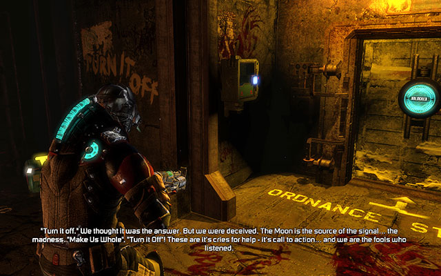 On the wall near the passage to the next room from the suit kiosk room - Chapter 16 | Secrets - Secrets - Dead Space 3 Game Guide