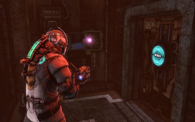 After climbing down the ladder, near the door, after starting the shuttle engine (fueling it) - Chapter 6 | Secrets - Secrets - Dead Space 3 Game Guide