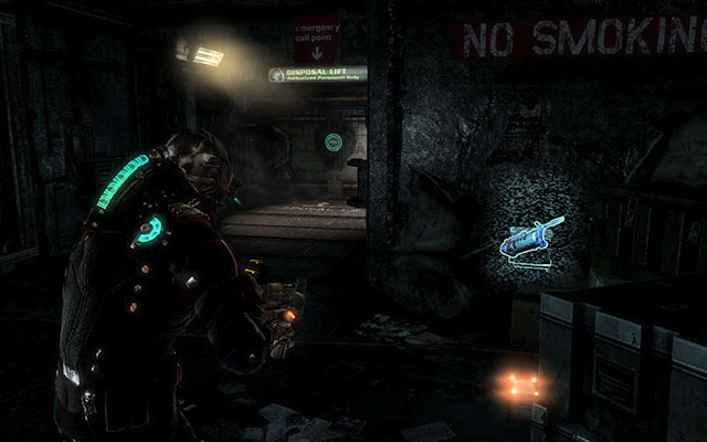 Behind the crate, next to the stairs, in the dark part of the corridor - Chapter 14 - p. 2 | Secrets - Secrets - Dead Space 3 Game Guide