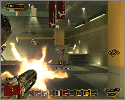 Carefully move towards the building lobby, shooting at enemies there (screen above) - (4) Aggressive solution: Finding Nia Colvin - Rescuing Megan and Her Team - Deus Ex: Human Revolution Game Guide