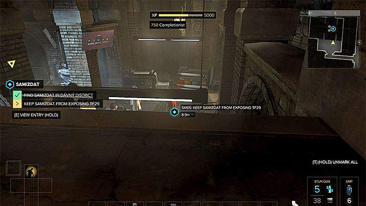 After reaching the upper ledge you will have a perfect view of the whole hackers hideout - Samizdat - side quest - Side quests - Deus Ex: Mankind Divided Game Guide