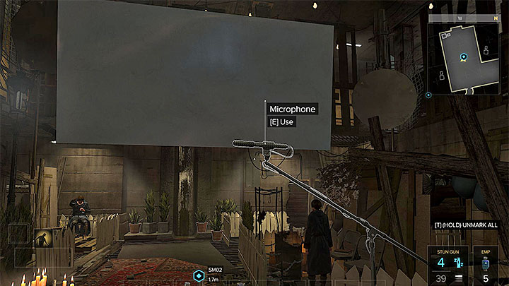 Use the microphone - Cult of Personality - side quest - Side quests - Deus Ex: Mankind Divided Game Guide