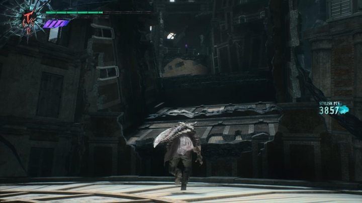 A little bit further theres the next fight waiting on a round arena - Mission 11 - Reason | Devil May Cry 5 walkthrough - Main story missions - Devil May Cry 5 Guide