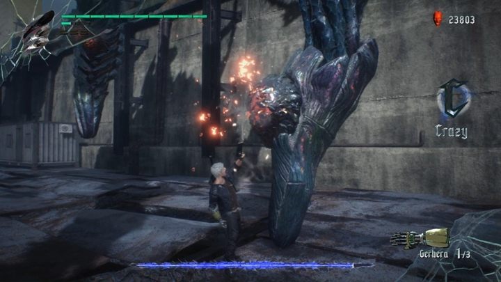 The boss is huge and it has only one weak spot - the red spot on the back - Gilgamesh Boss Fight Guide for DMC5 - Bosses - Devil May Cry 5 Guide