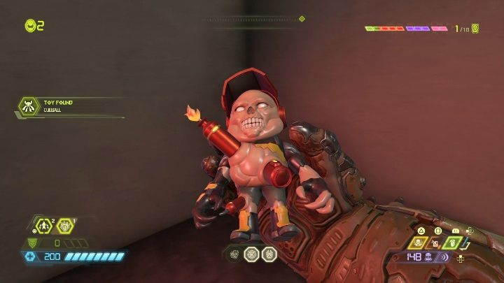 You will find the toy in a steep passage that currently looks like a balcony - Doom Eternal: Arc Complex secrets maps and location - Collectibles and secrets - Doom Eternal Guide