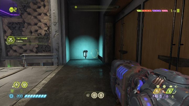 You will find the toy in a steep passage that currently looks like a balcony - Doom Eternal: Arc Complex secrets maps and location - Collectibles and secrets - Doom Eternal Guide