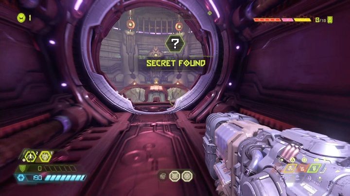 To get to the top of the machine, you must first enter the hallway and fire at a button on the ceiling - Doom Eternal: Urdak secrets maps and location - Collectibles and secrets - Doom Eternal Guide