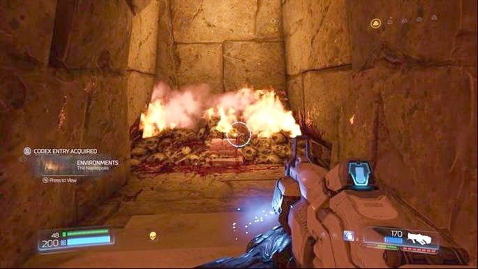 There is a green portal ahead of the skull - Doom: The Necropolis Walkthrough - Doom: Walkthrough - Doom Game Guide & Walkthrough