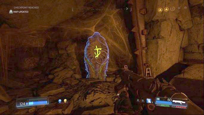 At the bottom you can use the Data Log in the form of an artifact and slightly further you can jump even lower - Doom: The Necropolis Walkthrough - Doom: Walkthrough - Doom Game Guide & Walkthrough