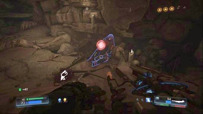 Once you take the first collectible, go to the other side of the cliff and wait the Mancubus that waits for you there - Doom: All secrets in The Necropolis - Doom: Secrets - Doom Game Guide & Walkthrough