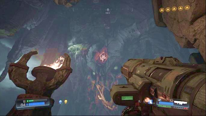 At the end of the level you should notice a big skull with a red rune on its forehead - Doom: All secrets in The Necropolis - Doom: Secrets - Doom Game Guide & Walkthrough