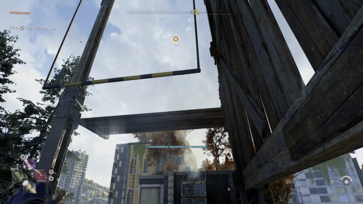 Lean out to the left and wait for the metal bar to slide down - Dying Light 2: Downtown (Windmills) - list - Windmills - Dying Light 2 Guide