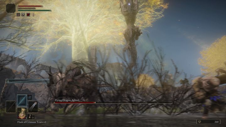 Once you've attacked its legs enough times, the dragon will fall over, allowing you to run up to its head - Elden Ring: How to beat Flying Dragon Agheel? - Elden Ring: All bosses in Limgrave - Elden Ring Guide