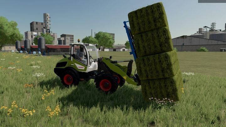 Front loaders have special tall forks, which are good at lifting and loading bales collected by forage wagons - Farming Simulator 22: Bailing - tips - Farming Simulator 22: Grass, hay and silage - Farming Simulator 22 Guide