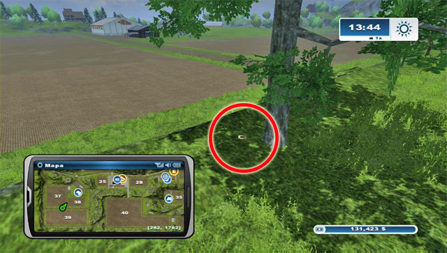 By a tree standing beside the road north of field 39 - Area A: horseshoes #1-#13 | Horseshoes - Horseshoes - Farming Simulator 2013 Game Guide