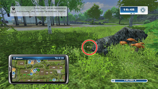 The horseshoe lies beside boulders east of the silos - Area E: horseshoes #45-#61 | Horseshoes - Horseshoes - Farming Simulator 2013 Game Guide