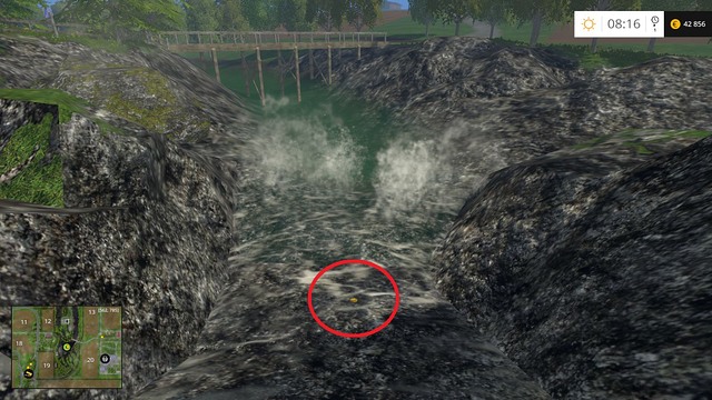 At the bottom of a small waterfall - Section C - coins 30 - 44 - Gold Coins - Farming Simulator 15 Game Guide