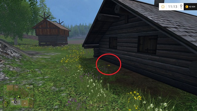 Behind a wooden hut - Section E - coins 55 - 69 - Gold Coins - Farming Simulator 15 Game Guide
