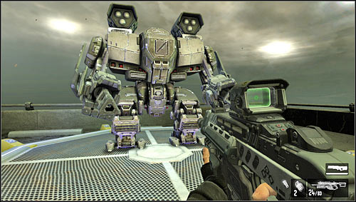 Our new toy [1] is equipped with rotating machine guns and rocket launchers to take down the helicopters or other mechs - Level 06: Bridge - Walkthrough - F.3.A.R. - Game Guide and Walkthrough