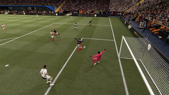 On the above screenshot you can see a situation in which a side midfielder cross the ball into the penalty area using low cross and the striker has taken the bicycle kick right in front of the goalie's nose - FIFA 21: Shots - Basics - FIFA 21 Guide
