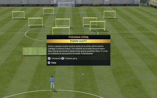 Silver challenge requires you to lob pass the ball into three nets, while avoiding the walls before them and trying not to hit any of the moving dummies - Lob pass - Skill games and practice - FIFA 15 - Game Guide and Walkthrough