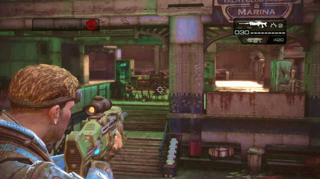 Get off the wharf and approach the wall on the left to find a declassified mission symbol - Wharf District - Downtown Halvo Bay - Gears of War: Judgment - Game Guide and Walkthrough