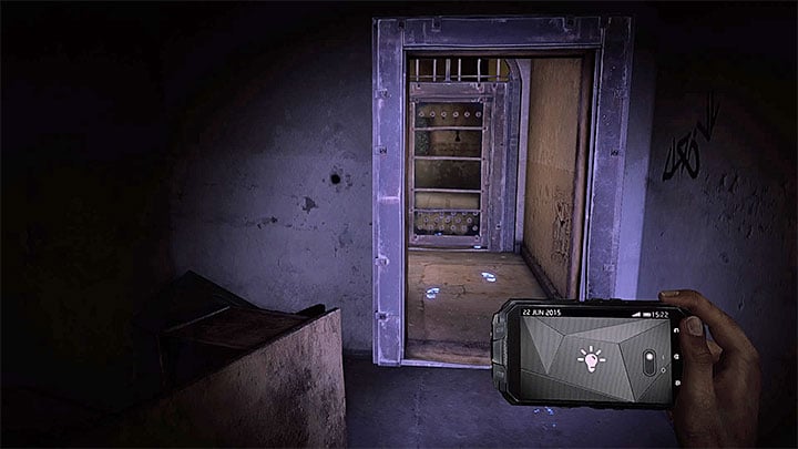 When exploring block B of the asylum, you will pass by John Keatings cell and reach the locked door presented in the screenshot - How to deal with the electronic door in the asylum (Black)? - Solving the puzzles - Get Even Game Guide