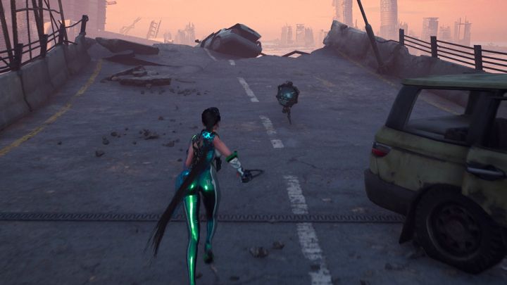 Go in the opposite direction to the mission objective and you will find the robot on the overpass - Stellar Blade: Tumbler Expansion Modules map - Secrets and Collectibles - Stellar Blade Guide