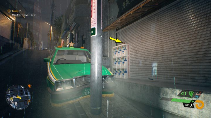 The relic is on the toy vending machines by the green car, east of the Utagawa Shrine - Ghostwire Tokyo: Relics, Central Tokyo - list of all - Relics - Ghostwire Tokyo Guide