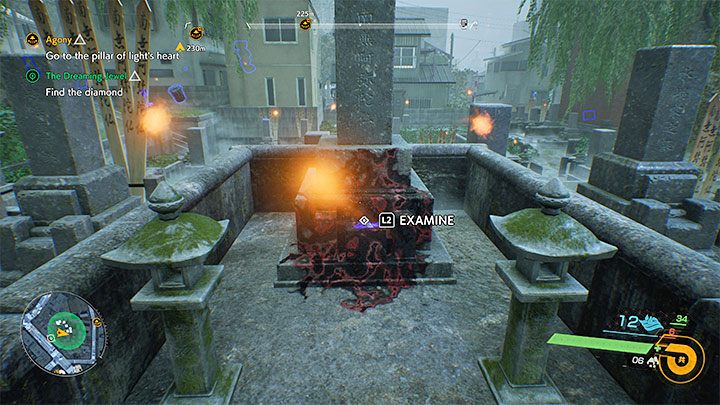 The diamond you're looking for can be found next to the tombstone pictured above, you'll recognize it due to the corruption covering its lower half - Ghostwire Tokyo: The Dreaming Jewel - walkthrough - Quests available from chapter 3 - Ghostwire Tokyo Guide