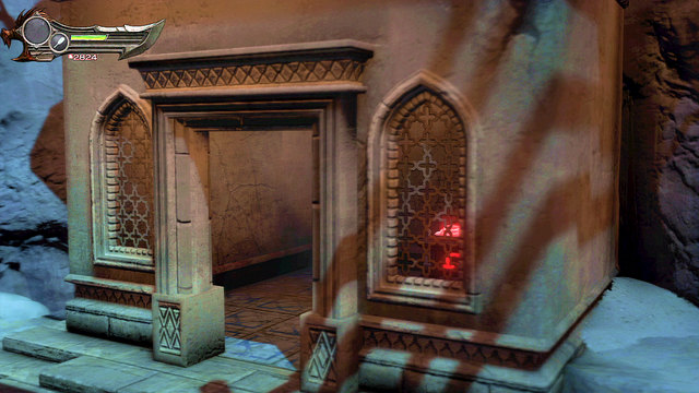 Jump down and go into the groundfloor of this building - The beginning of the village - Chapter 5: The Village of Kirra - God of War: Ascension - Game Guide and Walkthrough