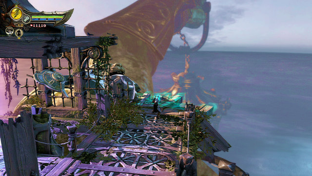 When you get at the top of the statue head for a head holding a lantern - Walkthrough - Chapter 26: Eyes of Apollo - God of War: Ascension - Game Guide and Walkthrough