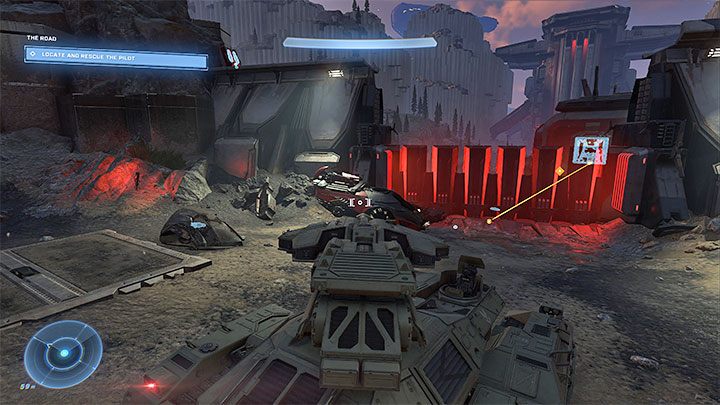You will eventually reach a closed gateand if you are still using the Scorpion tank or any other vehicle, then you should lower down the gate - Halo Infinite: The Road - walkthrough - Main missions - Halo Infinite Guide