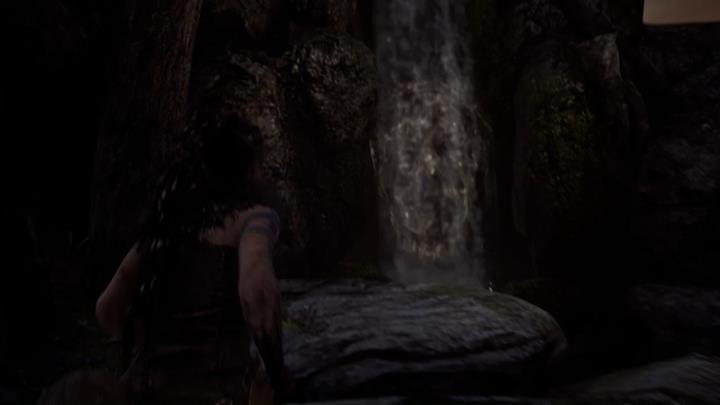 There is a face concealed next to the waterfall. - Hellblade Senuas Sacrifice: Rune doors in Surts Realm - Surts Realm - Hellblade: Senuas Sacrifice Game Guide