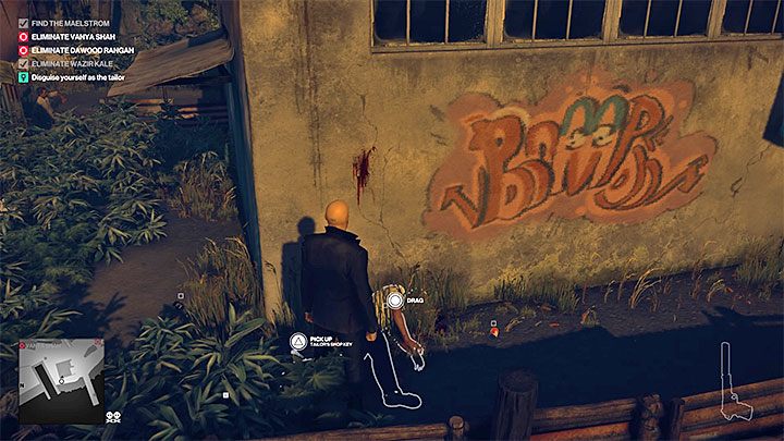 The tailor has stopped near the tall vegetation - Hitman 2: Story Missions - Chasing a Ghost walkthrough - Chasing a Ghost (Mumbai) - Hitman 2 Guide