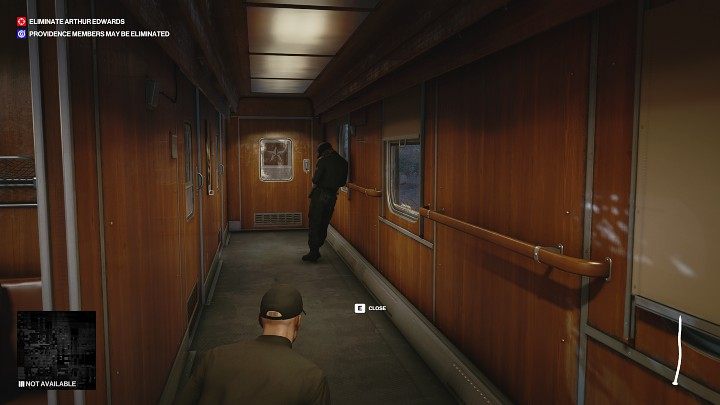 Wait for the guard to pass you, then go behind his back and reach the hallway with a door on the left - Hitman 3: Eliminating Arthur Edwards Carpathian Mountains, walkthrough - Untouchable - Carpathian Mountains - Hitman 3 Guide