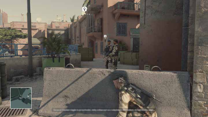 Two soldiers are talking about Zaydans prisoner - its a new opportunity to eliminate him. - Murdering Reza Zaydan | Marrakesh - Marrakesh: A Gilded Cage - Hitman Game Guide