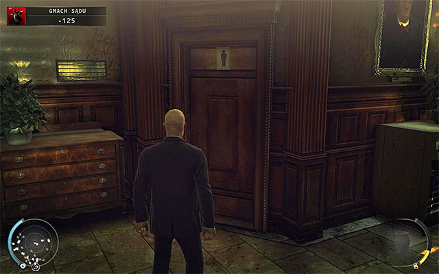 Left from the building entrance you can find toilets - Courthouse - Exploring the courthouse | 15: Skurkys Law - 15: Skurkys Law - Hitman: Absolution Game Guide