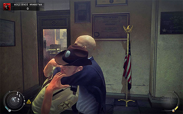 Once you reach its end, stop for few moments and wait until the cop in the room turns around and walks to the left - County jail | 16: Operation Sledgehammer - 16: Operation Sledgehammer - Hitman: Absolution Game Guide