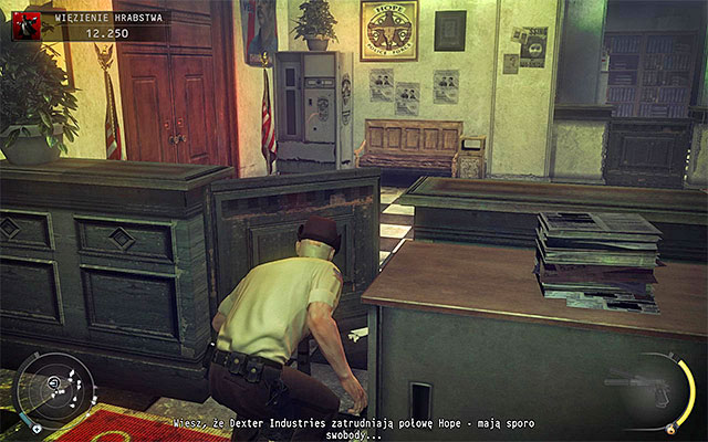 The exit from the county jail can be reached in two main ways: moving along the counter shown on the screen 1 to the right or heading to the door shown on the screen 2 (wait until recently bypassed cop walks to the left desk) - County jail | 16: Operation Sledgehammer - 16: Operation Sledgehammer - Hitman: Absolution Game Guide