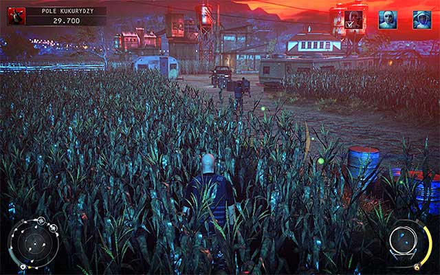 Proceed towards a large farmhouse seen in the distance, however make a stop near a trailer displayed on the screen above, because this is where Jaqueline Moorhead can be found - Cornfield - Murdering Jaqueline Moorhead | 14: Attack of the Saints - 14: Attack of the Saints - Hitman: Absolution Game Guide