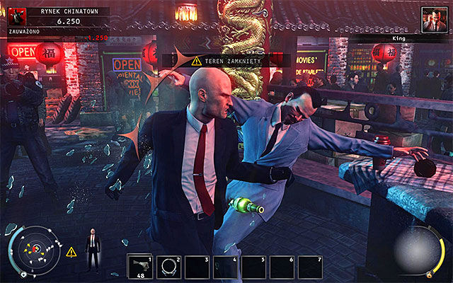 The most obvious way to eliminate the King of Chinatown is killing him while he stays in the fenced area - Chinatown square - Murdering the King of Chinatown | 2: The King of Chinatown - 2: The King of Chinatown - Hitman: Absolution Game Guide