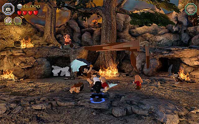 Eliminate orcs and avoid the stones thrown by the boss - Stage 8 (Out of the Frying Pan...): The battle with Azog the Defiler | Walkthrough - Walkthrough - LEGO The Hobbit Game Guide & Walkthrough